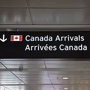 Canada arrivals sign